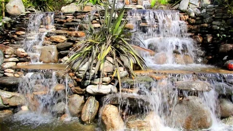 Waterfall flowing from the rocks Stock Footage 74636717