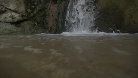 Waterfall flowing in slow motion Stock Footage 79736890