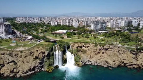 This waterfall flows directly into the Mediterranean Sea Stock Footage 340267218
