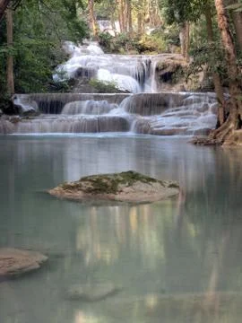 Waterfall that flows down to the floor Stock Photos