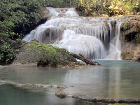 Waterfall that flows down to the floor Stock Photos