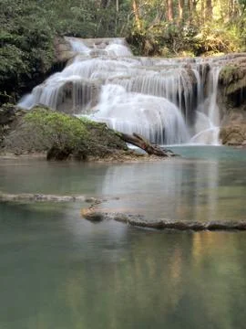 Waterfall that flows down to the floor Stock Photos