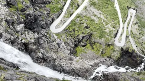 A waterfall flows down the trolls path Stock Footage 317246239