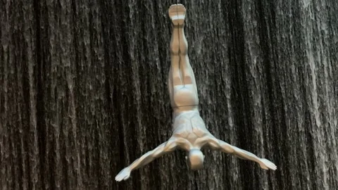 Waterfall with Flying Diving Men inside Dubai Mall. Stock Footage 154162982