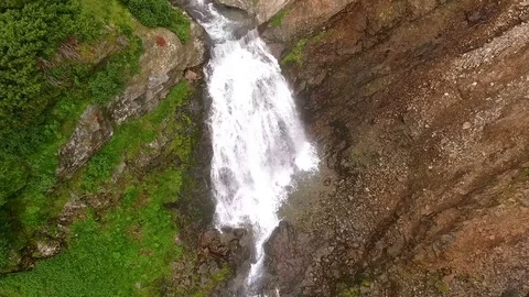 Waterfall Flying over the mountain river. Aerial View Kamchatka Stock Footage 72570148