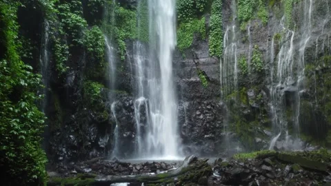 Waterfall at the foot of the Mountain Stockbeeldmateriaal 240485901