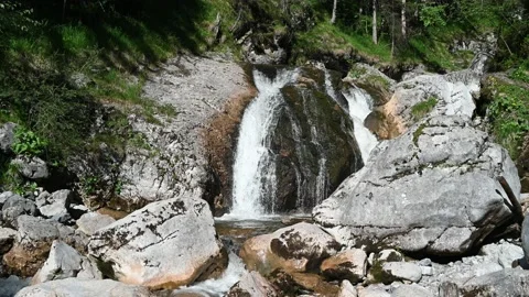A waterfall in the forest with beautiful rocks Stock-Footage 219351698