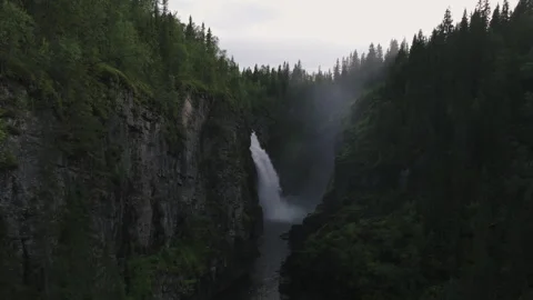 Waterfall in the forest between the canyon walls Stock Footage 255333329