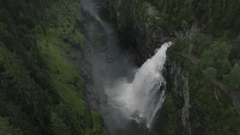 Waterfall in the forest canyon going downwards incline Stock Footage 255336065