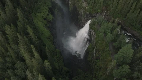 Waterfall in the forest canyon tilting down and going forward version 2 Stock Footage 255381900