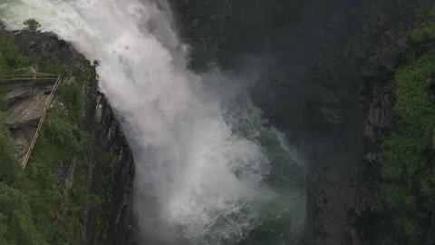 Waterfall in the forest canyon tilting down and going up, version 1 Stock Footage 255382791