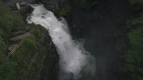 Waterfall in the forest canyon tilting down and going up, version 2 Stock Footage 255384378