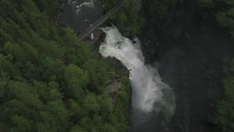 Waterfall in the forest canyon tilting down and going up, version 3 Stock Footage 255385319