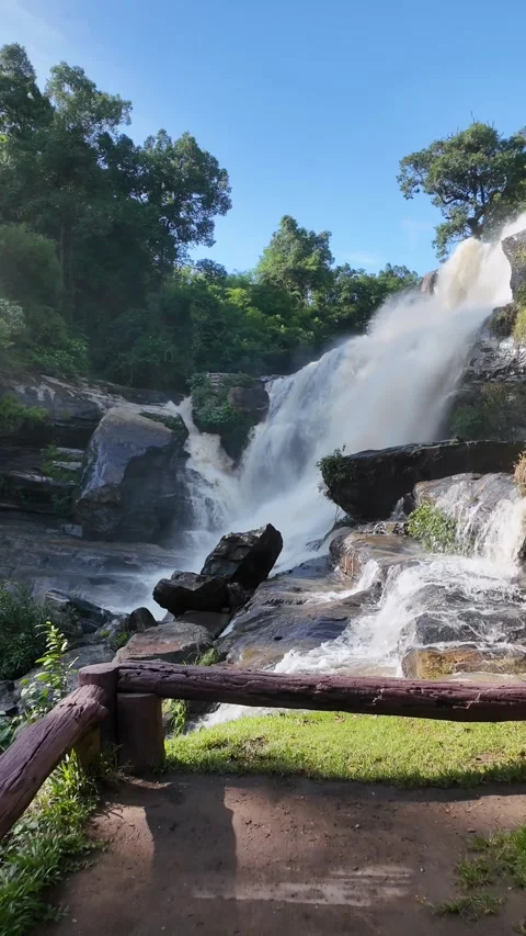 Waterfall in the forest that flows strongly during the rainy season.  Video stock 310039899