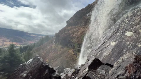 A waterfall in a forest Stock Footage 239654029