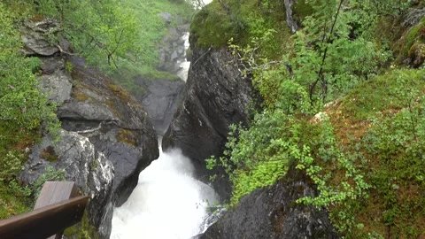 Waterfall in forest with mist in Swedish forest Stock Footage 136530971