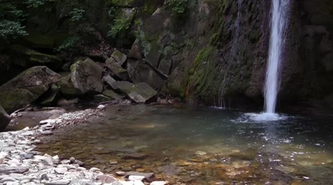 Waterfall in a forest in the North Caucasus Stock Footage 7752296