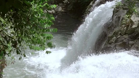 Waterfall on a Forest River. Slow Motion Stock Footage 106375740