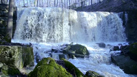 Waterfall in forest slow motion smooth movement Stock Footage
