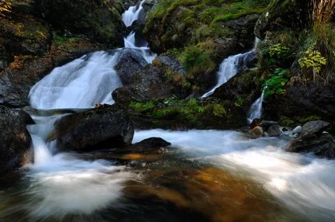 Waterfall in forest in slow shutter Stock Photos