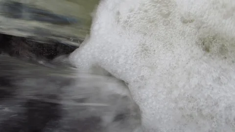 WATERFALL FORMES WHITE FOAM Stock Footage 129089790