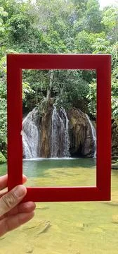 Waterfall framed in nature Stock Photos