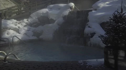 Waterfall in front of resort Stock Footage 61083850