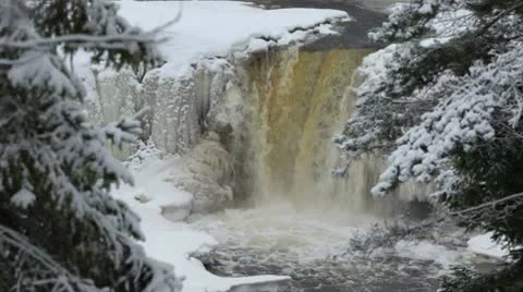 Waterfall on frozen river Stock Footage 10578163