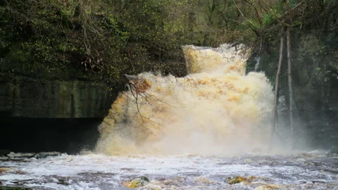 Waterfall in full spate 60p Stock Footage 296729546