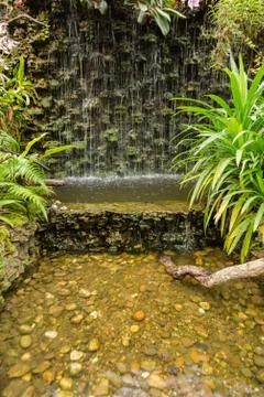 Waterfall in garden Stock Photos