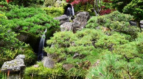 Waterfall in the garden Stock Photos