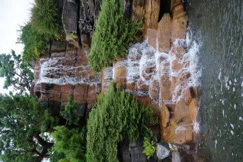 Waterfall in the garden Stock Photos