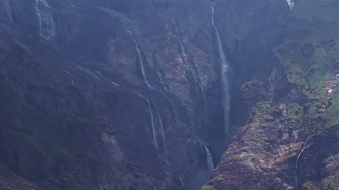 Waterfall from glacier melting in upper himalayan mountains. Water streams .. Stock Footage 279871281