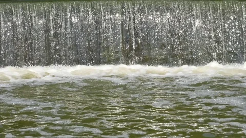Waterfall glistens in the sun. 스톡 동영상 121926683