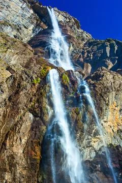 Waterfall in high mountains Stock Photos