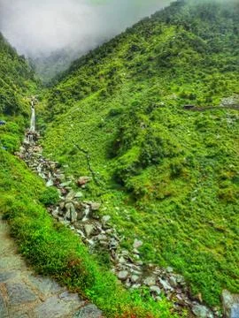 Waterfall on hill Stock Photos
