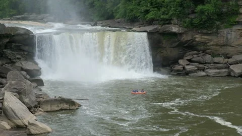 Waterfall with Inflatable Raft 4K Stock Footage 155366532