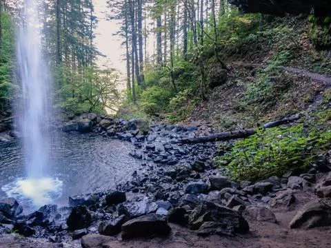 Waterfall inside a forest Stock Photos