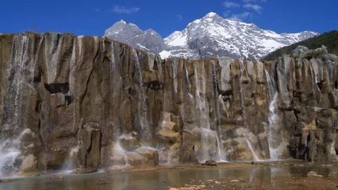 Waterfall at Jade Dragon Mountain Stock Footage 88224622