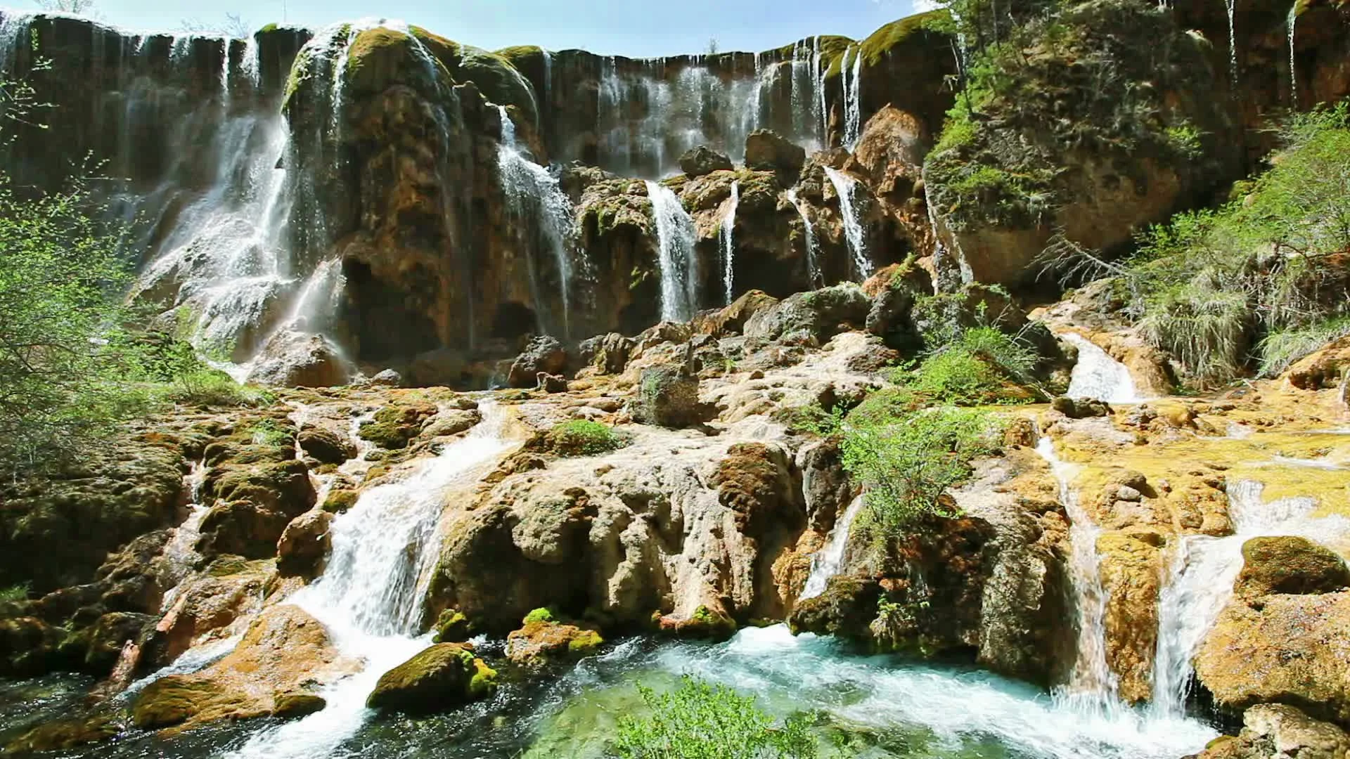 Waterfall Cascading in Nine-Village Valley, Sichuan, China скачать