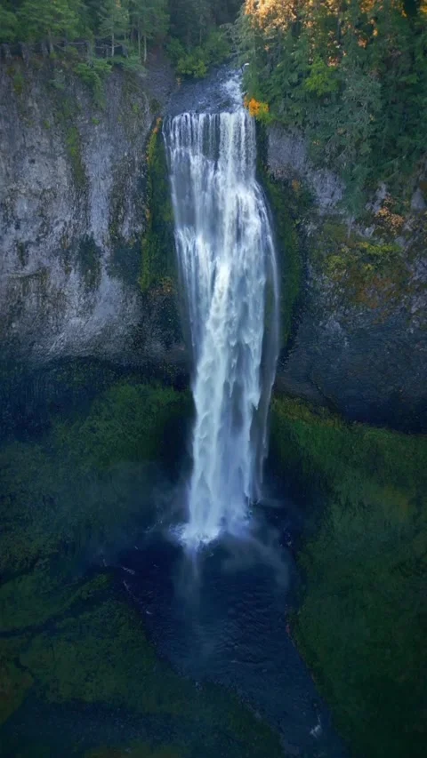 Waterfall in the jungle between mountains Stock Footage 274110627