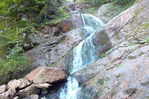 Waterfall into jungle Stock Photos