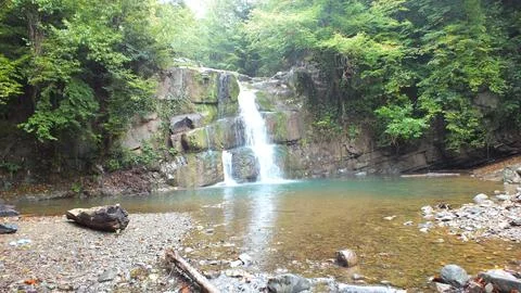 Waterfall into jungle Stock Photos