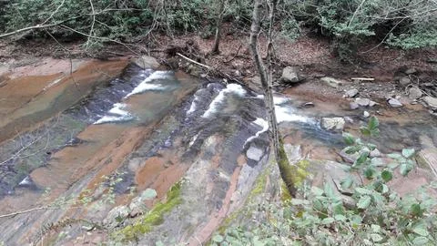 Waterfall into jungle Stock Photos