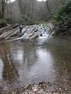 Waterfall into jungle Stock Photos