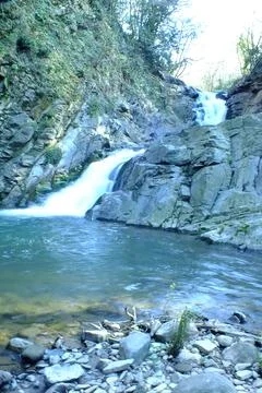 Waterfall into jungle Stock Photos