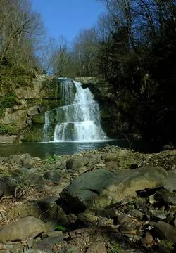 Waterfall into jungle Stock Photos