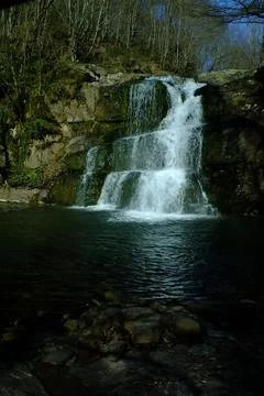 Waterfall into jungle Stock Photos
