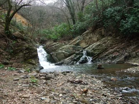 Waterfall into jungle Stock Photos