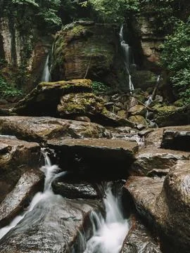Waterfall into jungle Stock Photos